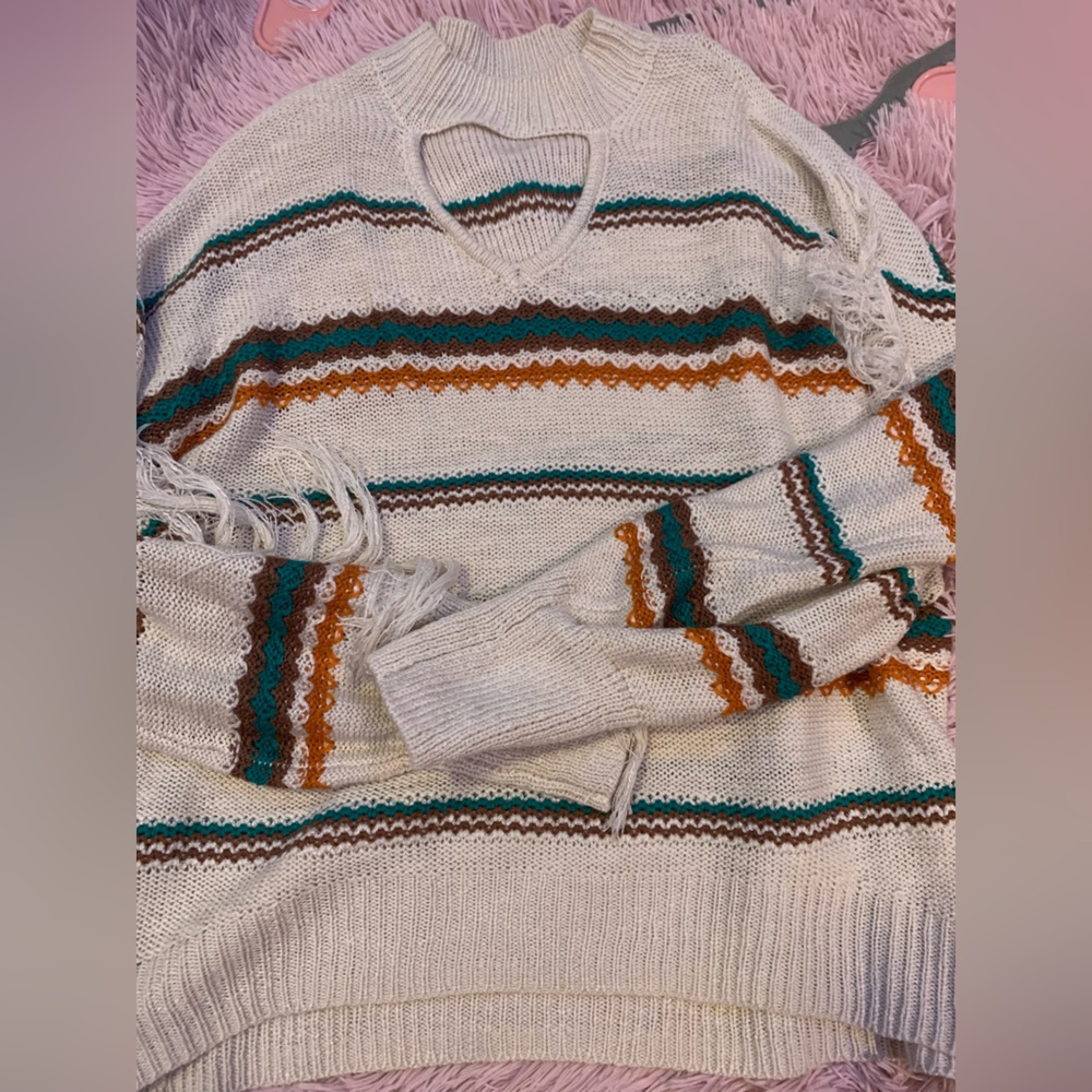 CATO sweater with frills on the arms and a keyhole neck style